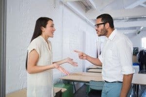 Side view of casual business colleagues in an argument